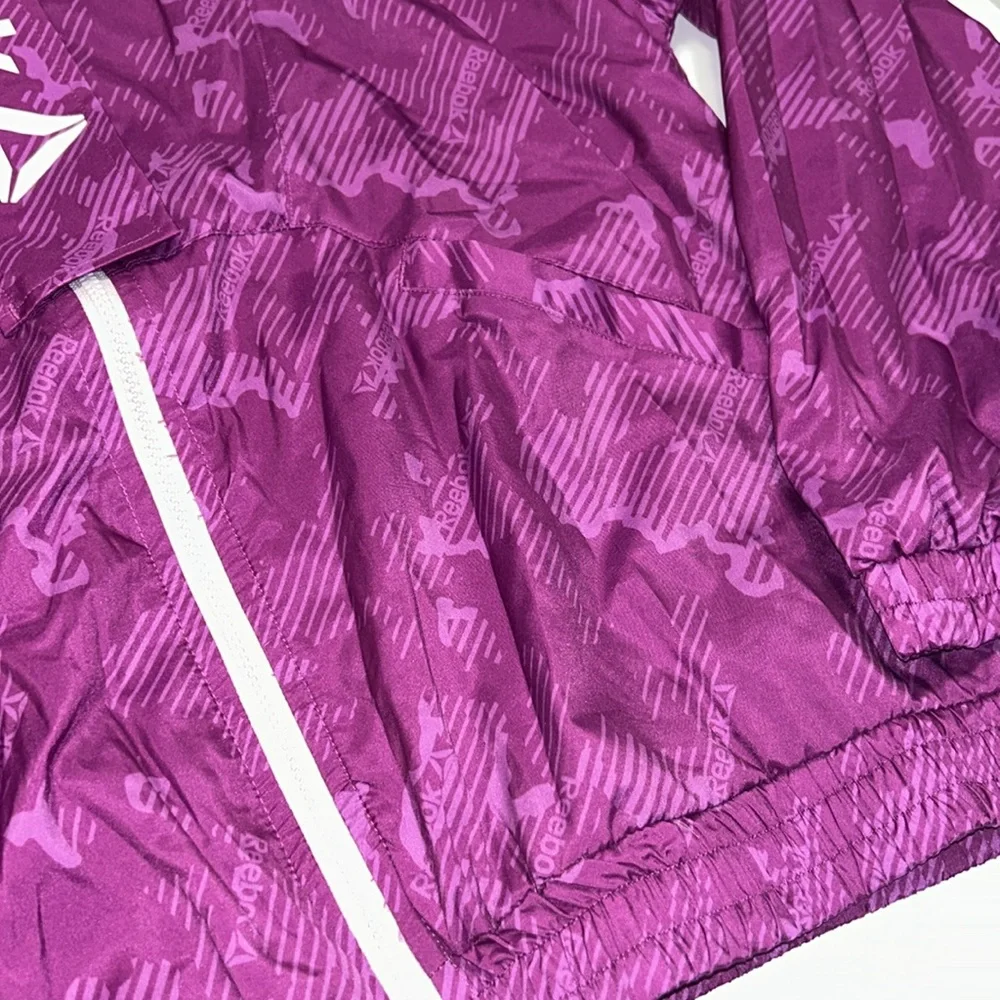Vintage Reebok purple 90s 80s windbreaker. Unisex. Excellent condition. Size M